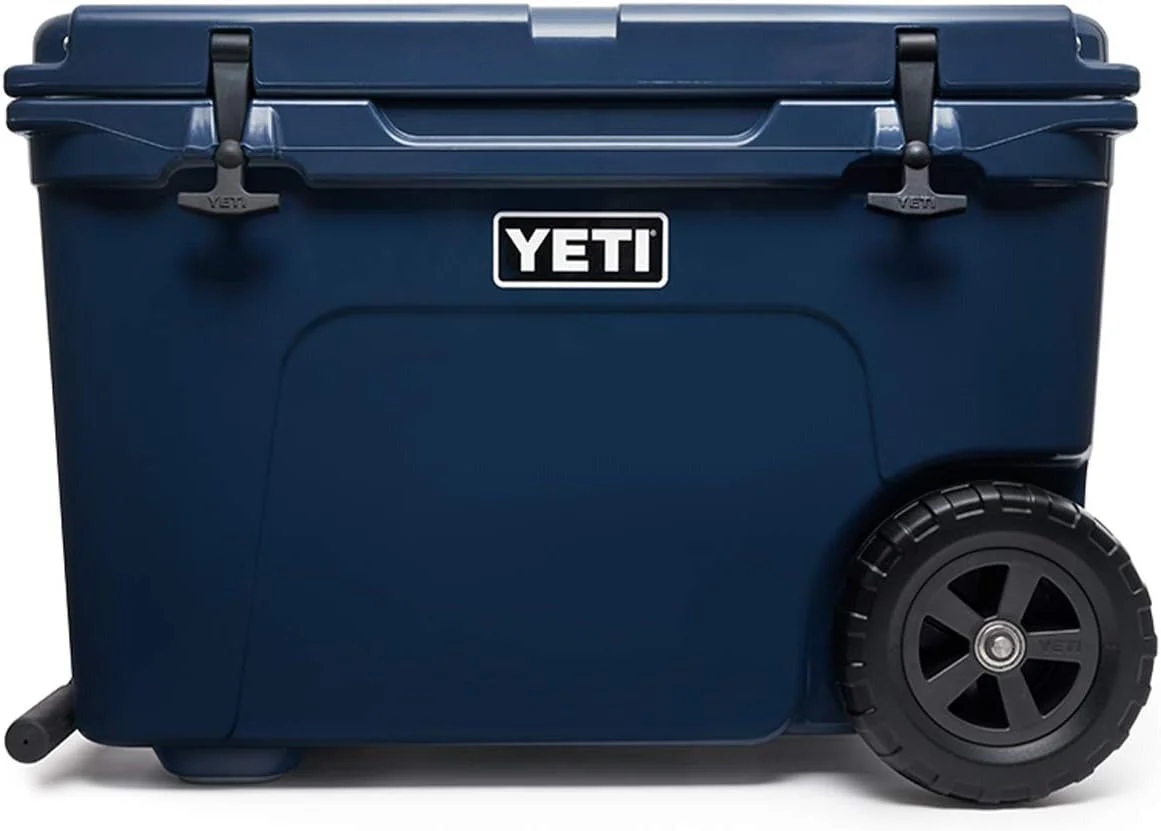 0b102562e8641d2868c22de0cbf0a97c5af1df9e7ed8f88729cc13a16bd7440a YETI Tundra Haul Cooler Box with Wheels, Navy Blue