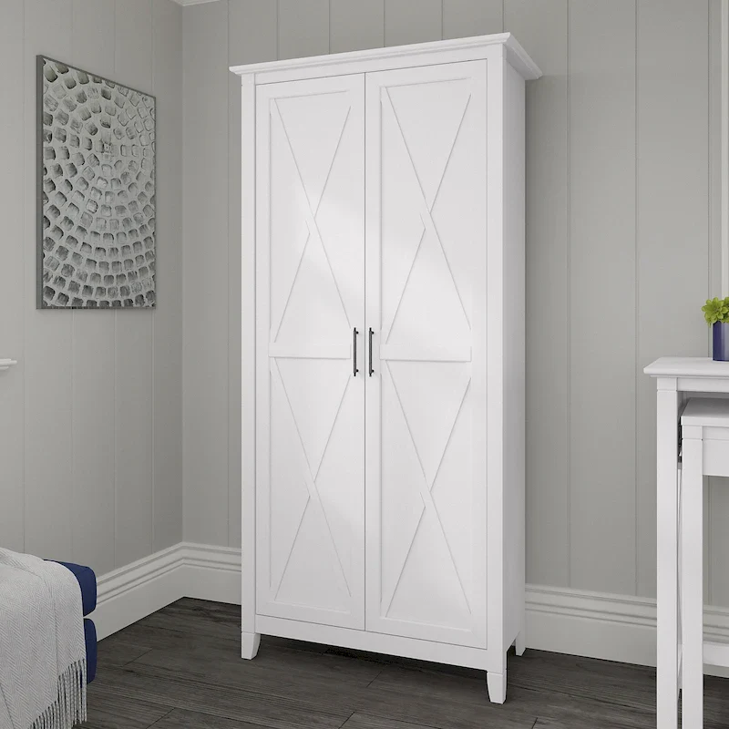 1f431bc8bd425a6ba26bf397b9d97330dbb98b03dd2c091a7f1dff2aa55d9db3 Key West Tall Storage Cabinet with Doors and Shelves by Bush Furniture(Pure White Oak)