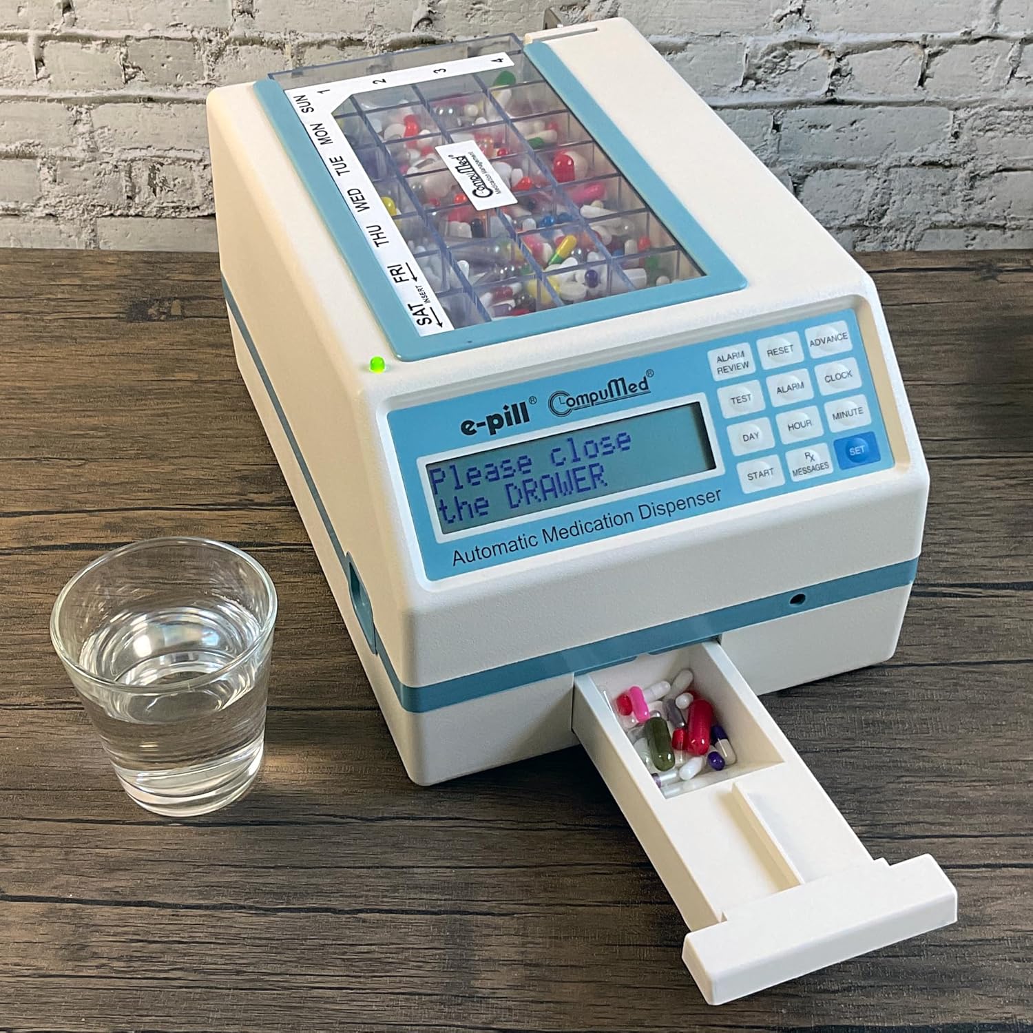 5d0bf63fe0874960e5803d863d4fa337fd1d9b38e8aeb88e4f3b36b79c305f21 CompuMed - Tamper Resistant Automatic Pill Dispenser - AC Powered