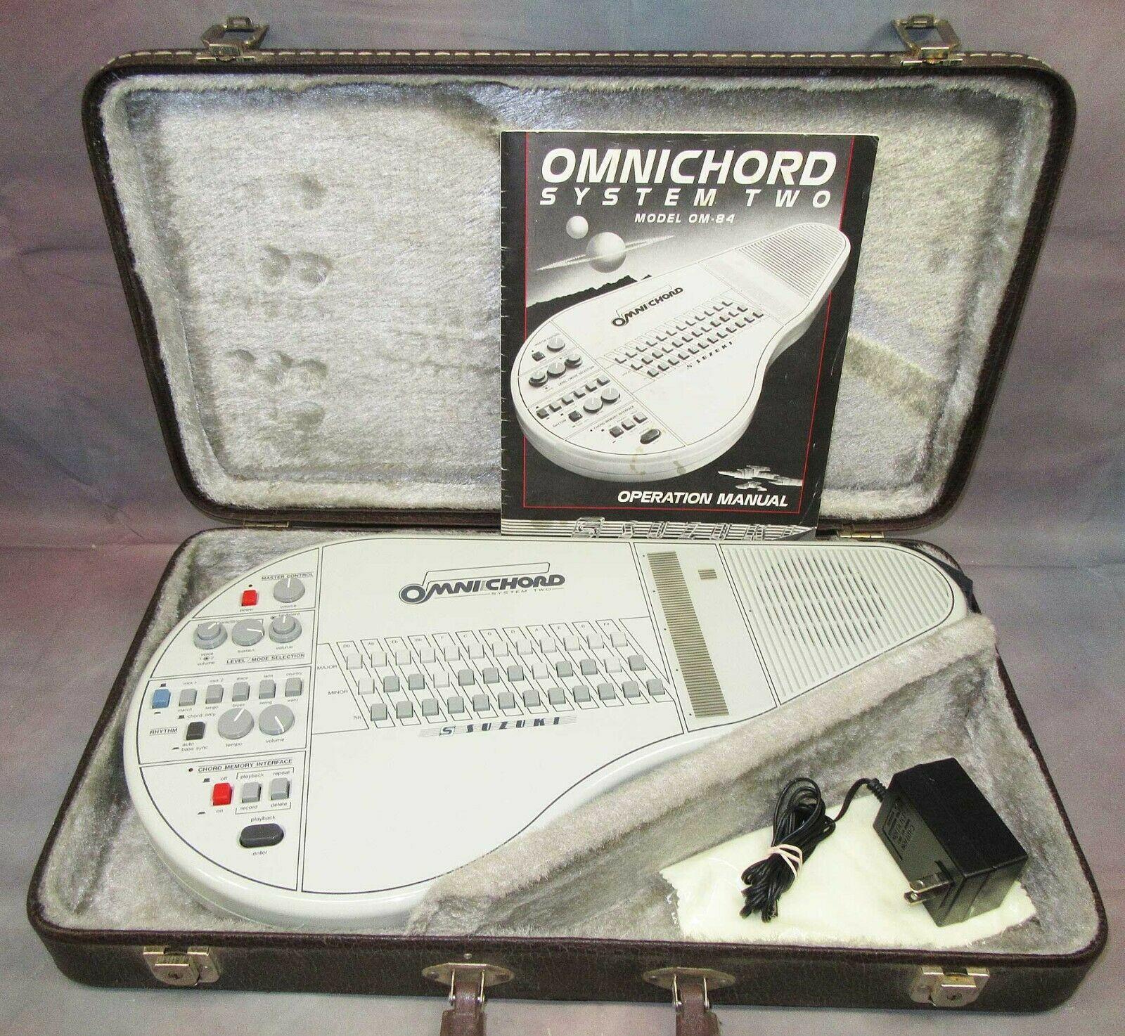 bd4789f95371dd2b7231d88098e121d11b699d0cf68b157fc53b7ed7f3c704b4 Suzuki Omnichord OM-84 System Two w/ Hard Case Power Supply Manual TESTED! WORKS