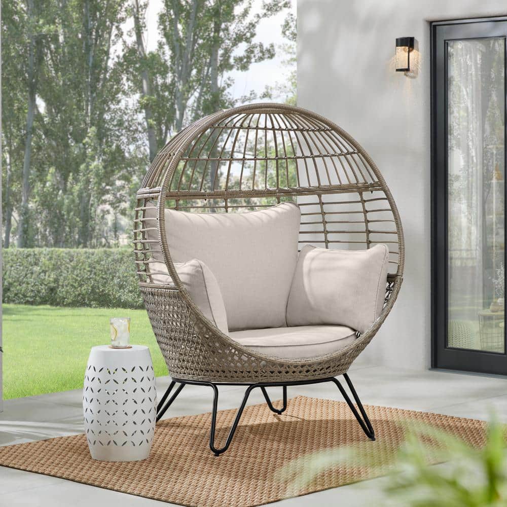 eaa21f7380fa4da84cac40d5fc89792ab1141b7a232ea8bb626418667ba14675 Hampton Bay Tan Stationary Wicker Round Outdoor Lounge Egg Chair with CushionGuard Almond Biscotti Cushions FRS51294M