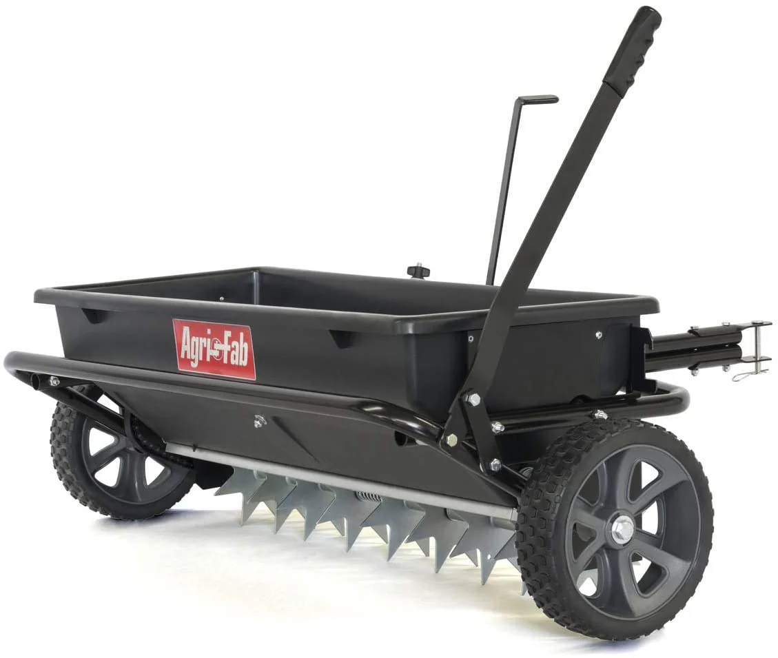 f44d8e98ccd019d0830757bc1939bd3e667c2d34d49b747a17da27dd01648b1a 100 lb. Tow-Behind Lawn Garden Spiker/Seeder/Drop Spreader for Seed,Fertilizer, Salt, Ice Melt; Designed to Pull Behind Lawn Garden Tractors